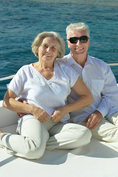 Elderly couple resting on yacht — Stock Photo, Image