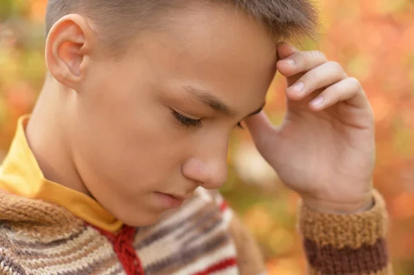 Sad boy outdoors — Stock Photo, Image