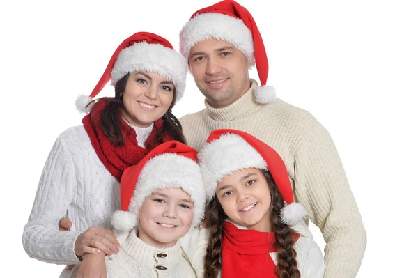 Aile ile Noel Baba şapkaları çocuklarda — Stok fotoğraf