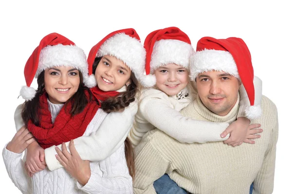 Famille avec enfants en chapeaux de Père Noël — Photo