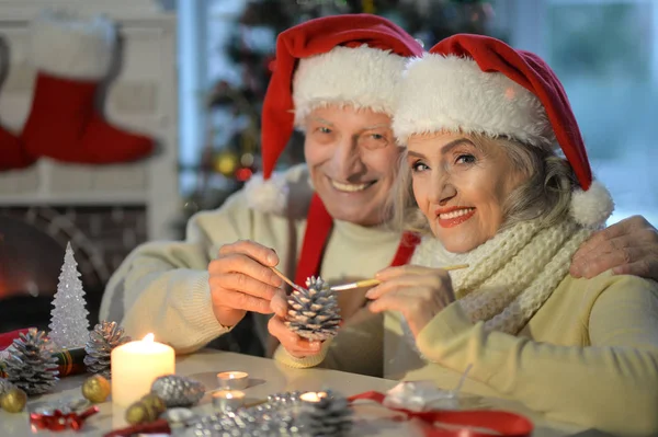 Senior couple preparing for Christmas — Stock Photo, Image