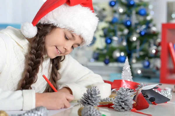 Little girl writing letter — Stock Photo, Image