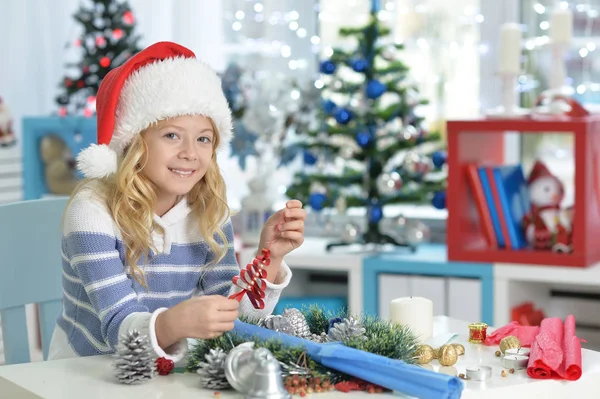 Little girl preparing for Christmas — Stock Photo, Image