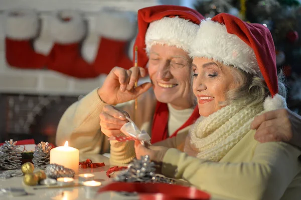 Senior couple preparing for Christmas — Stock Photo, Image