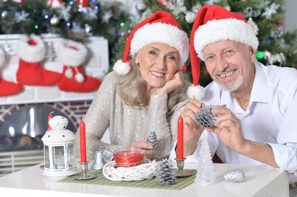 Senior couple preparing for Christmas — Stock Photo, Image