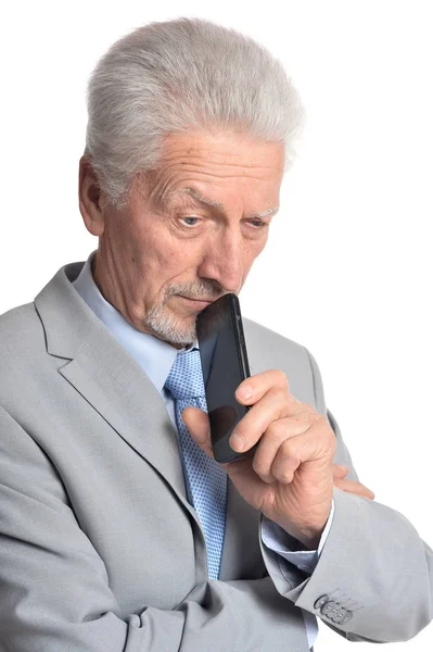 Starszy człowiek z smartphone — Zdjęcie stockowe