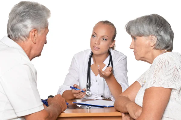 Senior Couple and young doctor — Stock Photo, Image