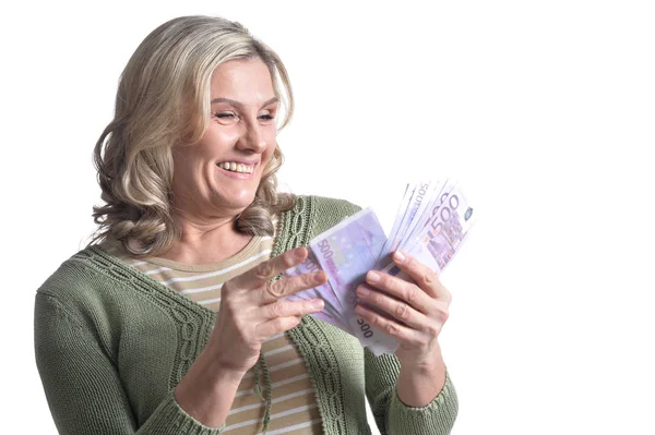 Бизнесмен, держащая банкноты — стоковое фото