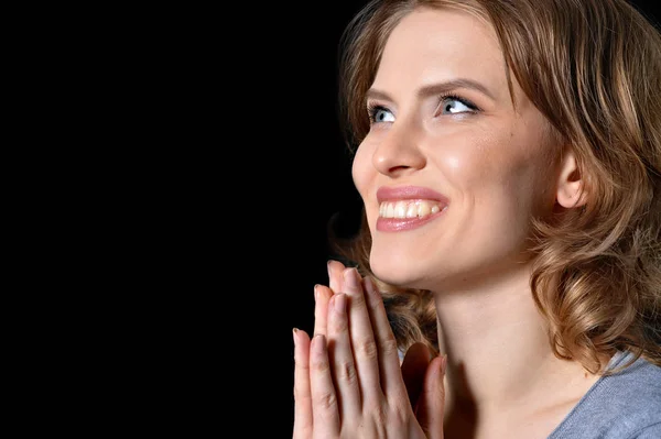 Young woman praying — Stock Photo, Image