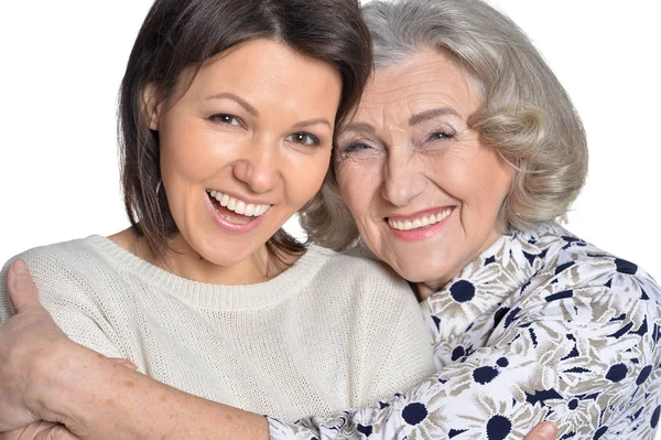 Mujer con hija sonriendo —  Fotos de Stock