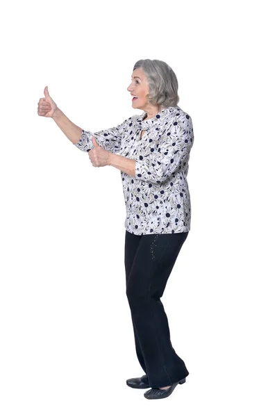 Senior woman showing thumb up — Stock Photo, Image