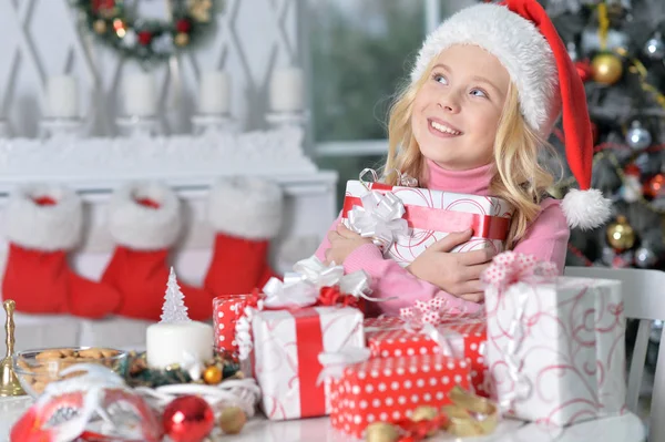 Portrait Happy Girl Santa Hat Sitting Christmas Presents — Stock Photo, Image