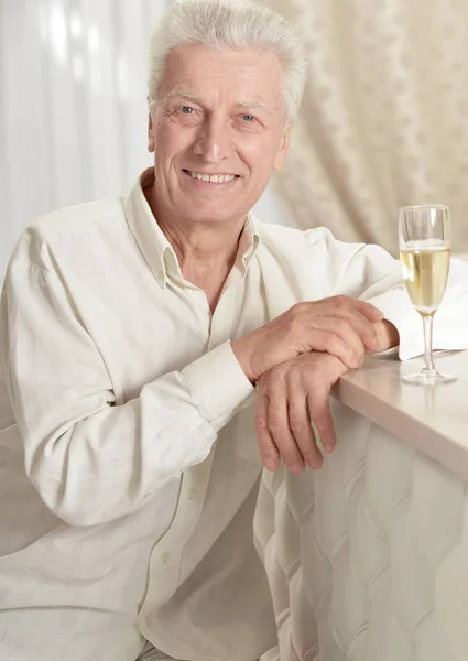 Happy Senior Man Champagne Home — Stock Photo, Image