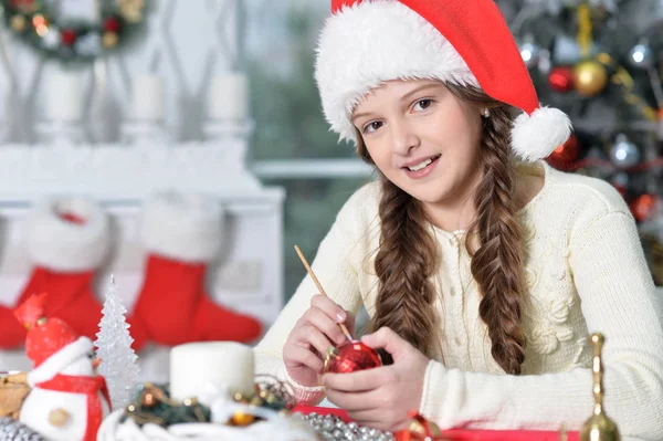 Portrait Happy Girl Santa Hat Preparing Christmas Sitting Table — Stock Photo, Image