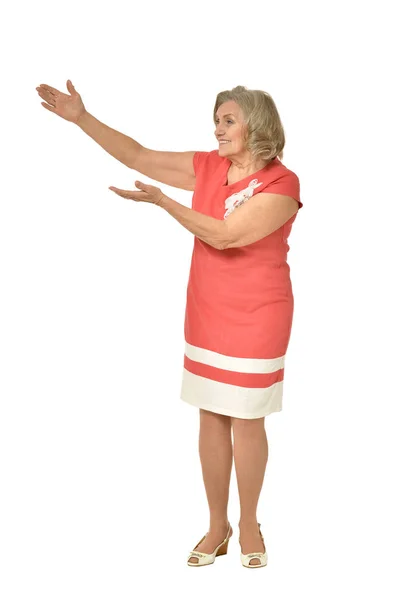 Emotionele Bejaarde Vrouw Iets Tonen Een Witte Achtergrond — Stockfoto