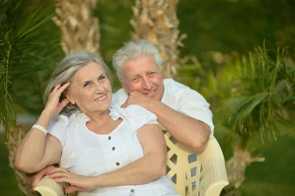 Loving Senior Couple Sitting Tropical Garden — Stock Photo, Image