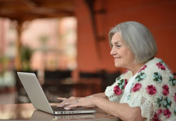 Smiling mature woman — Stock Photo, Image