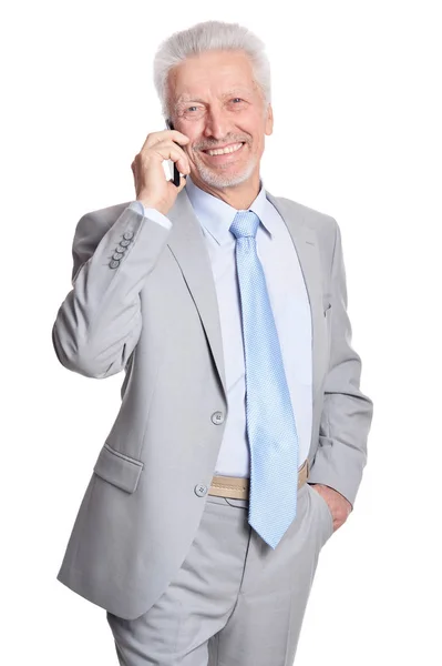 Happy Senior Businessman Posing Smartphone White Background — Stock Photo, Image