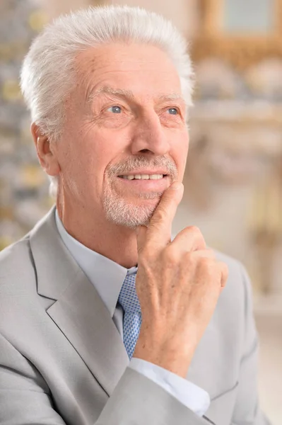 Portrait Senior Man Thinking Indoors — Stock Photo, Image