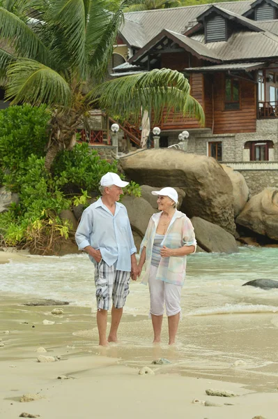 Happy Elderly Couple Walking Tropical Beach — Stock Photo, Image