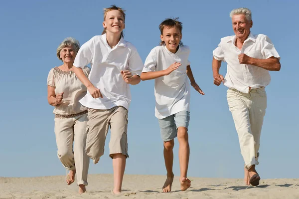 Happy Family Playing Catch Sand — Stock Photo, Image