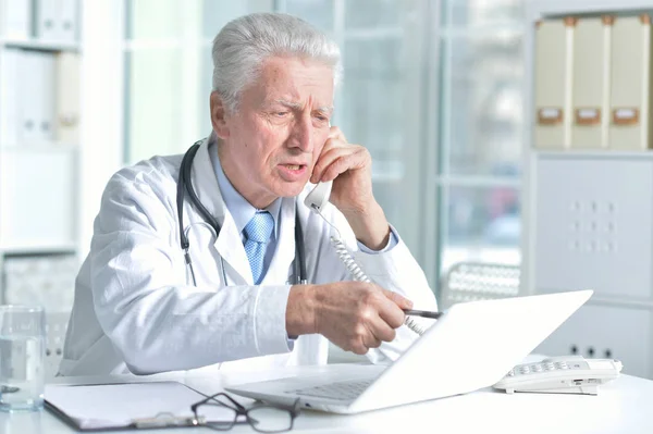 Portrait Confident Senior Male Doctor Stethoscope Working Office — Stock Photo, Image