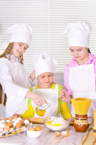 Cute Little Girls Chef Hats Aprons Preparing Dough Kitchen Home — Stock Photo, Image