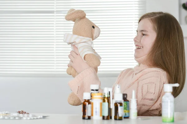 Young Sick Girl Toy Medicines Sitting Table — Stock Photo, Image