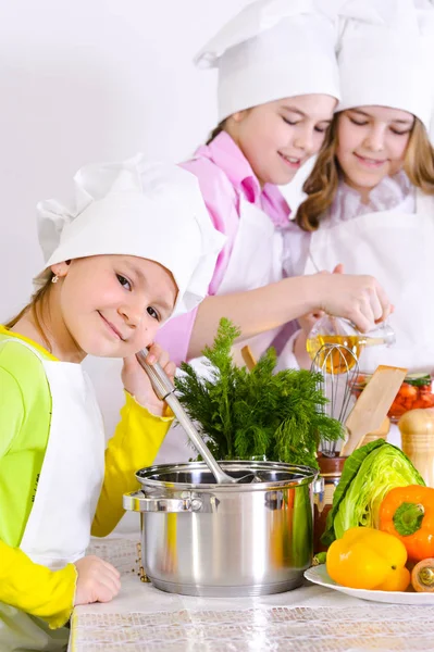 Cute Little Girls Chef Hats Aprons Preparing Dinner Kitchen Home — Stock Photo, Image