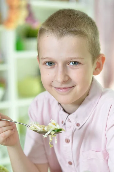 Cute Little Boy Eating Fresh Salad Kitchen — Stock Photo, Image