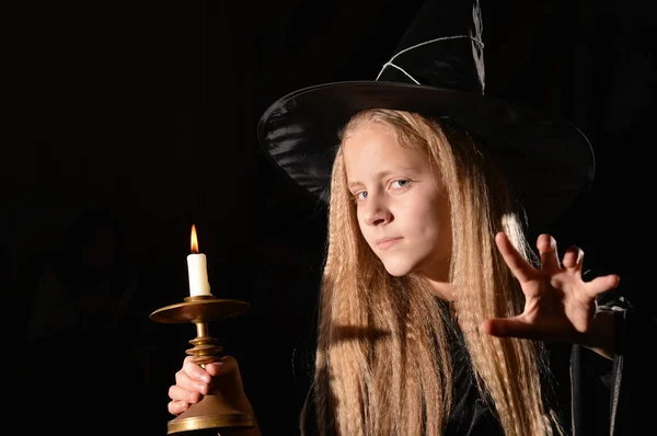 Cute girl in witch costume — Stock Photo, Image