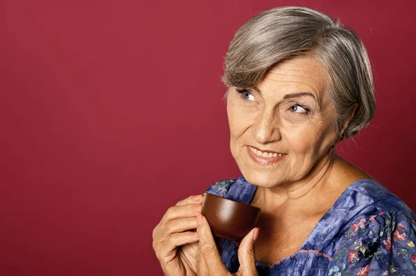 Beautiful Smiling Senior Woman Drinking Tea — Stock Photo, Image