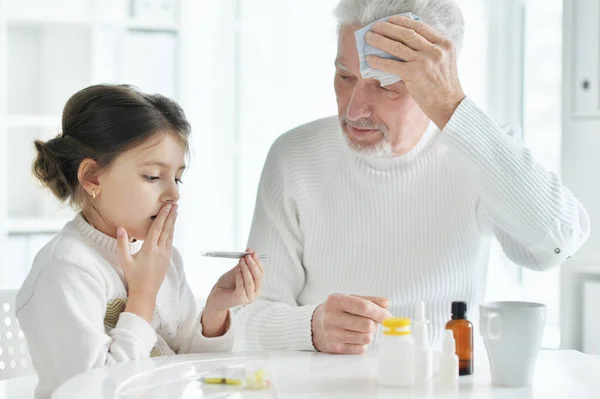 Sick Granddaughter Grandfather Sitting Home — Stock Photo, Image