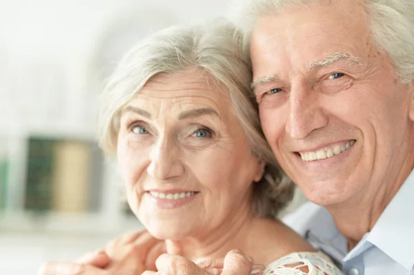 Cheerful Senior Couple Embracing Home — Stock Photo, Image