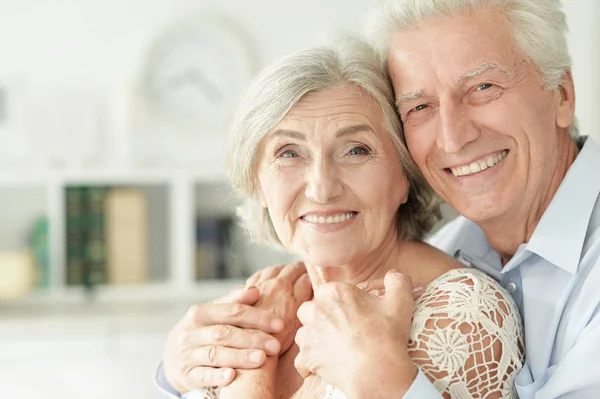 Cheerful Senior Couple Embracing Home — Stock Photo, Image