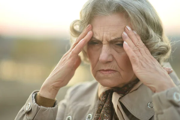 Sad Senior Woman Headache Park — Stock Photo, Image