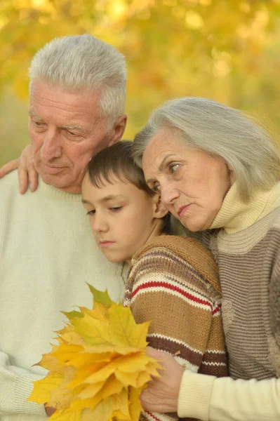 Sad Grandfather Grandmother Grandson Hugging Park — Stock Photo, Image