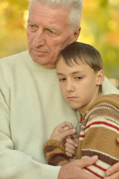 Sad Grandfather Grandson Hugging Park — Stock Photo, Image