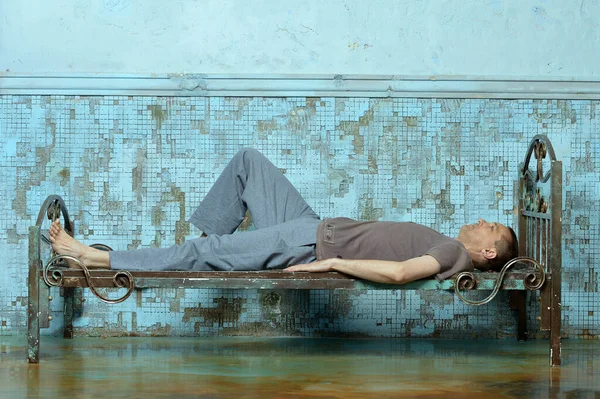 Man Metal Rusty Bed Prison — Stock Photo, Image