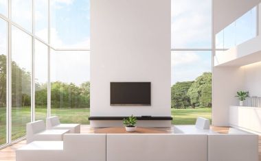 Modern white  living room with nature view 3d rendering image.The room has wooden floor and white wall.furnished with white leather furniture.There are large windows look out to see the nature clipart