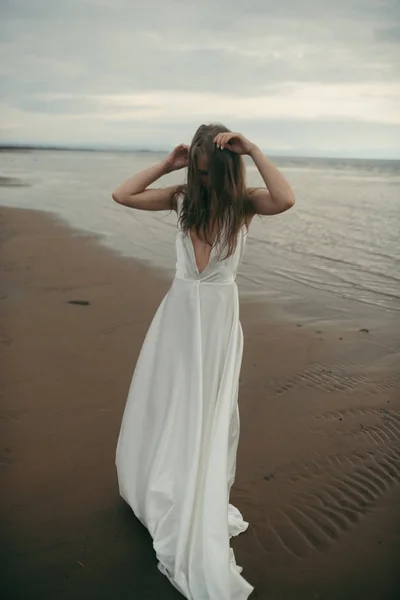 Portrait sexy girl with a beautiful body in the sea — Stock Photo, Image