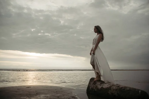 Girl in white dress in the sea — Stock Photo, Image