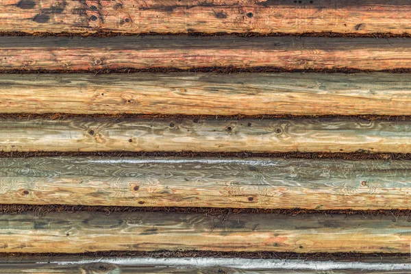 Parede feita de troncos — Fotografia de Stock