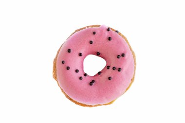 Pembe çörek küçük siyah yuvarlak boncuk beyaz zemin üzerine serpilir