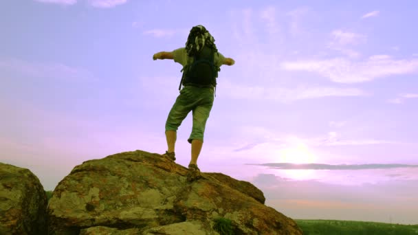 Man  tourist with  raised hands  at sunrise, sunset time. 4K 3840x2160 — Stock Video