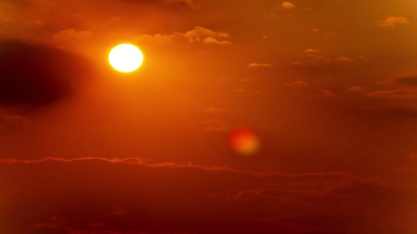 Beautiful cloudy sky with  sun in red and orange tones. 4K 4096x2304 . Without birds — Stock Video