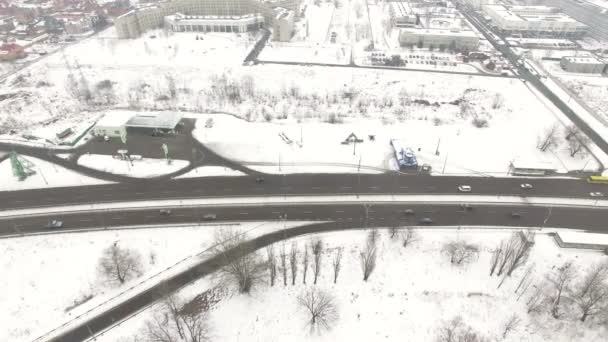 4K Aerial. Top view  of winter highway with car. Lateral flight — Stock Video