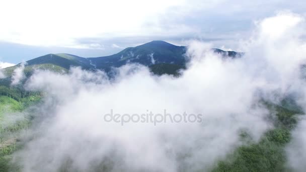 4K .Aerial. Flight in mountains among clouds. Real shoot — Stock Video