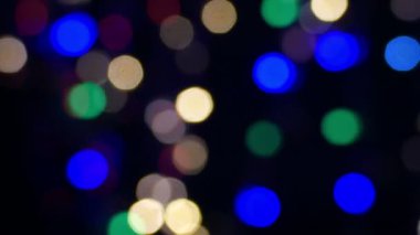 4 k. sönen soyut Noel veya koyu arka plan şenlikli renk ışıkları