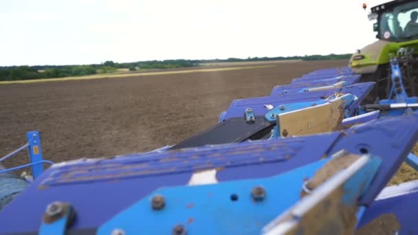 Agriculture Industry Team Tractor Plows Earth Field Steady Shot Slow — Stock Video
